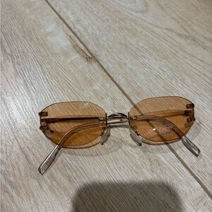 Le Specs pink lens frameless Sunglasses